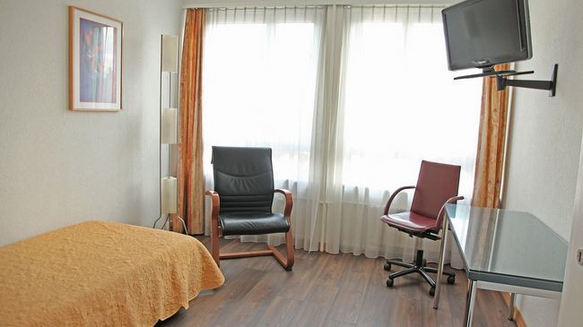 Hotel Comedie Ženeva Pokoj fotografie