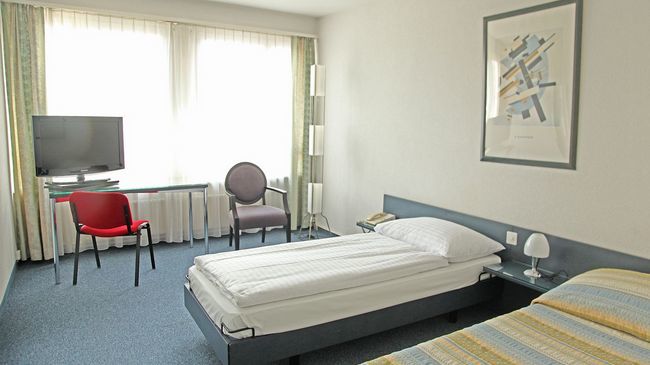 Hotel Comedie Ženeva Pokoj fotografie